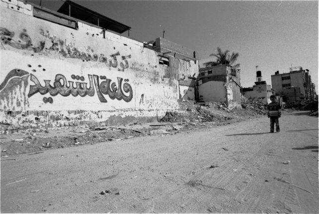 “Martyrs of the massacre” — graffiti after an incursion