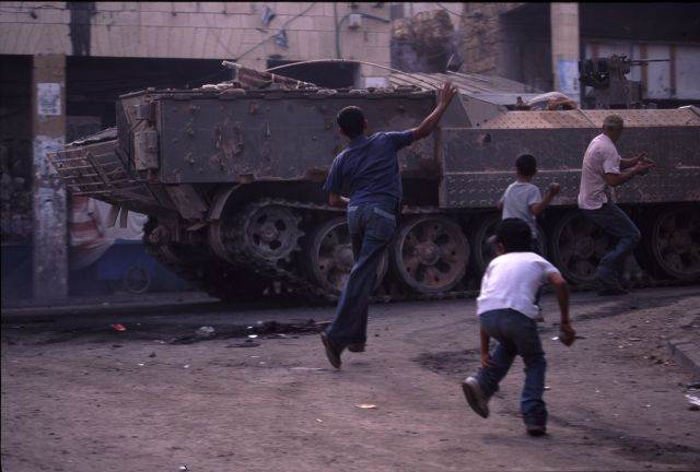 Stones against an armored personnel carrier — Gaza Strip